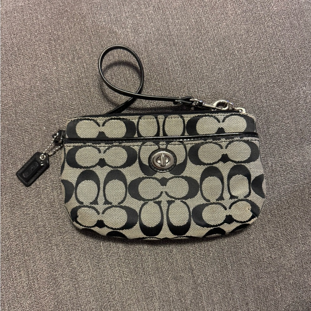 Brand new Coach wristlet